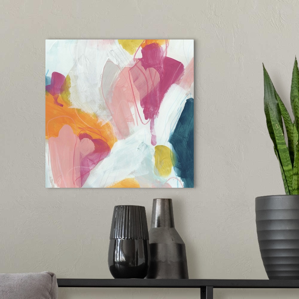 A modern room featuring Abstract contemporary artwork with bright pink and yellow against deep blue.