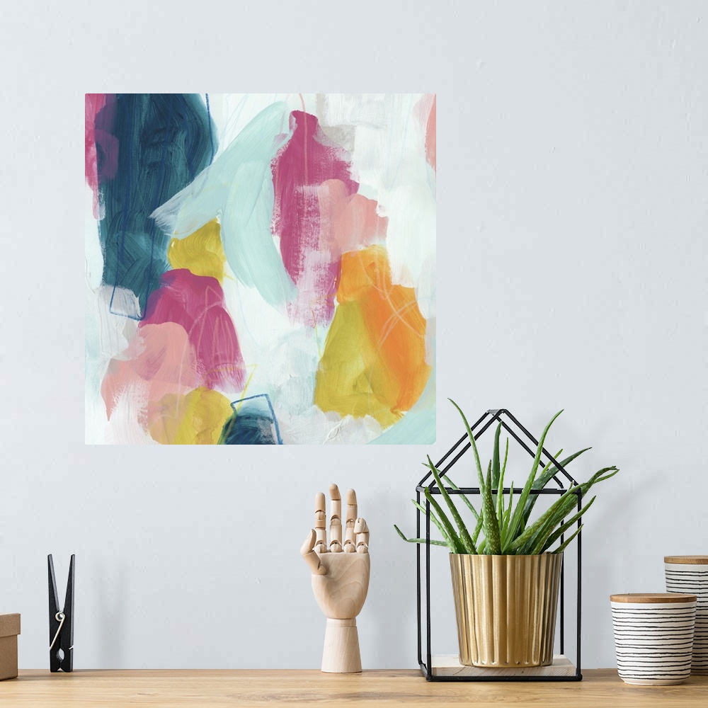 A bohemian room featuring Abstract contemporary artwork with bright pink and yellow against deep blue.