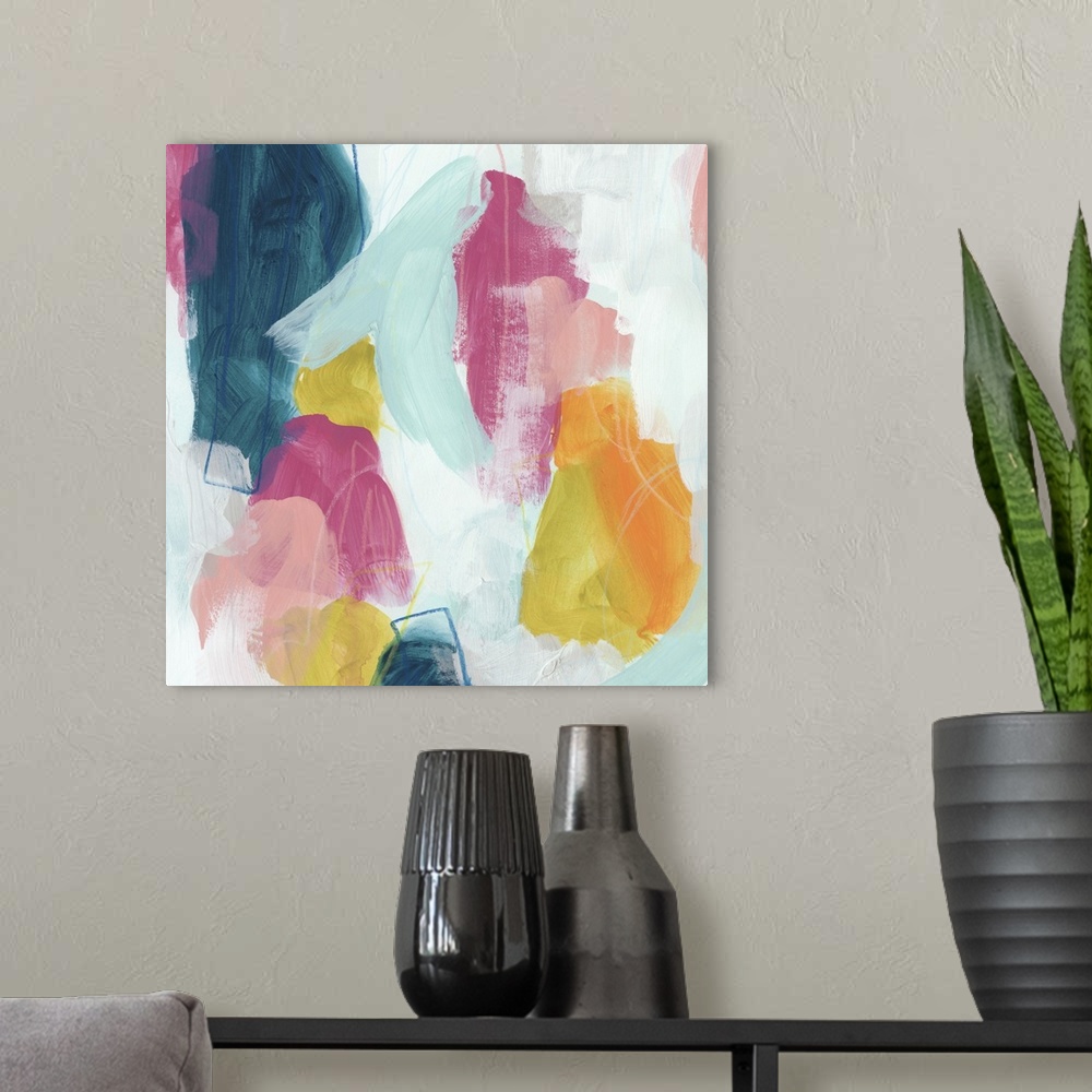 A modern room featuring Abstract contemporary artwork with bright pink and yellow against deep blue.