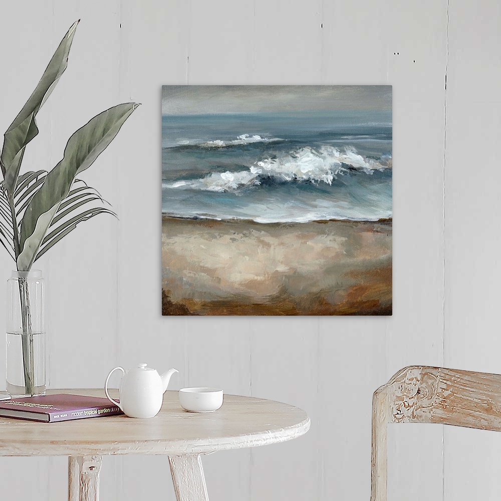 A farmhouse room featuring Big square painting of crashing waves on a shore with storm clouds in the background.