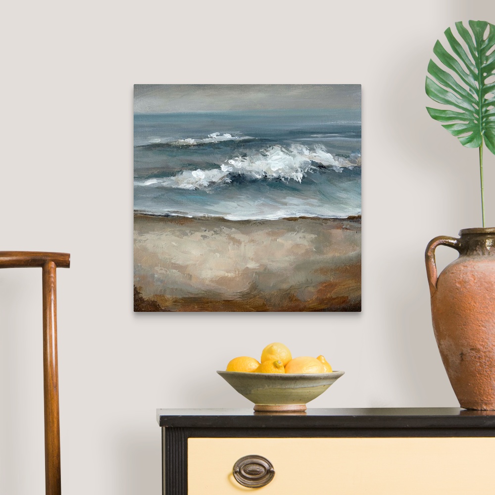 A traditional room featuring Big square painting of crashing waves on a shore with storm clouds in the background.