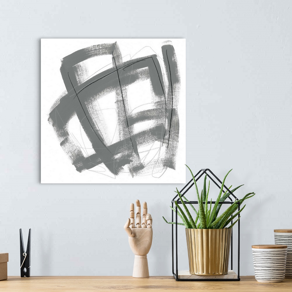 A bohemian room featuring Contemporary abstract painting using bold gray contrasting against a stark white background.