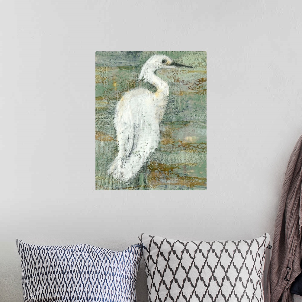 A bohemian room featuring Contemporary artwork of a white heron against a weathered dark background.