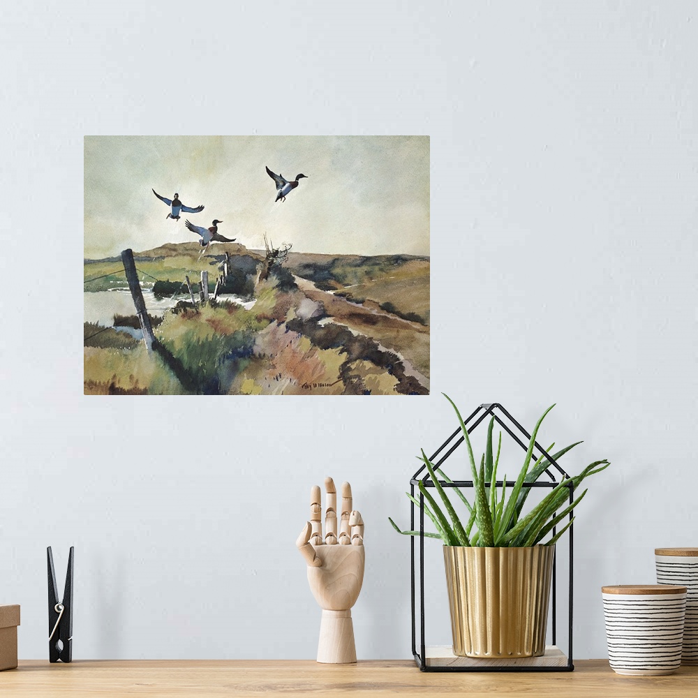 A bohemian room featuring Contemporary watercolor painting of birds taking off into flight.