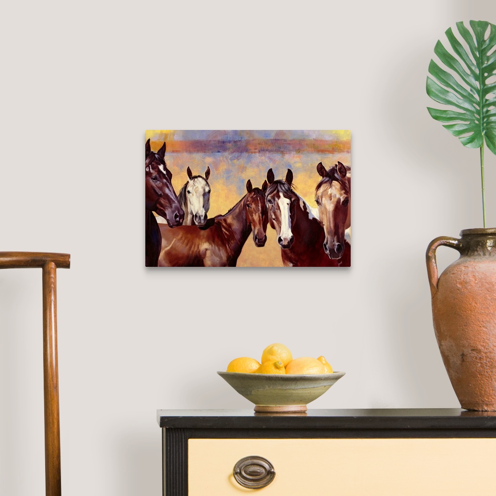A traditional room featuring Contemporary artwork of horses that are all standing together and looking straight at you. The ba...
