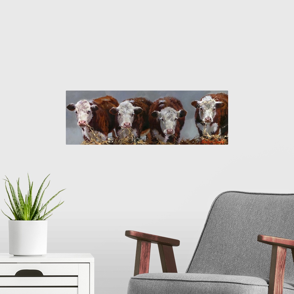 A modern room featuring Contemporary painting of four cows eating hay.