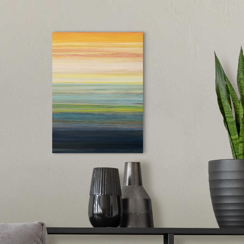 A modern room featuring Contemporary abstract painting of layered colors resembling a sunset.