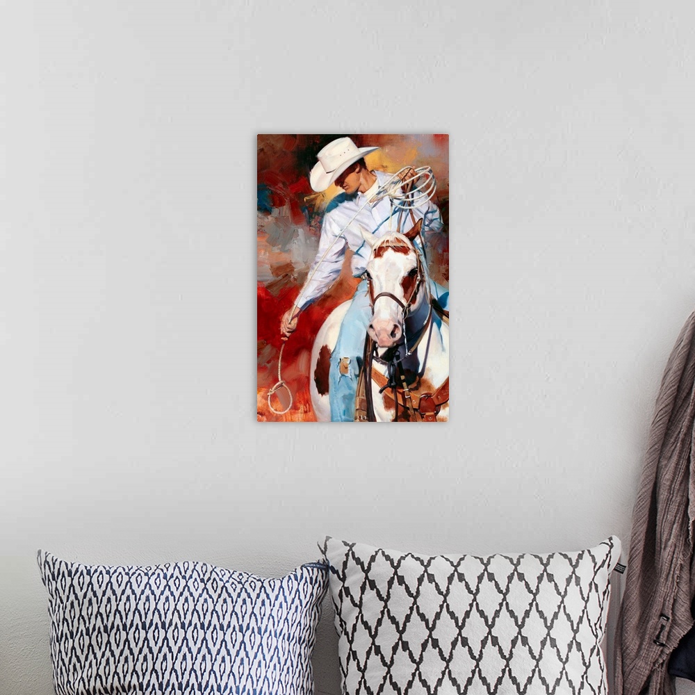 A bohemian room featuring Contemporary vertical panoramic painting of cowboy on horse holding a looped rope.