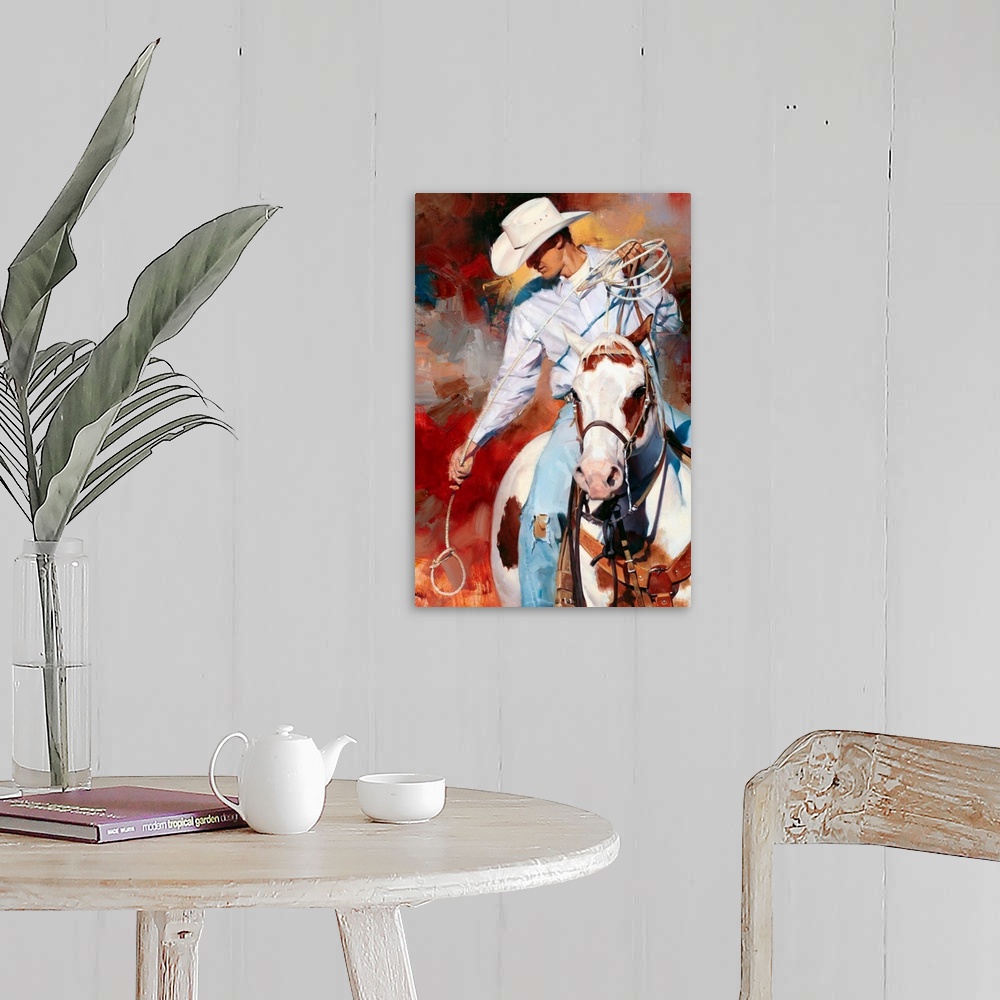 A farmhouse room featuring Contemporary vertical panoramic painting of cowboy on horse holding a looped rope.