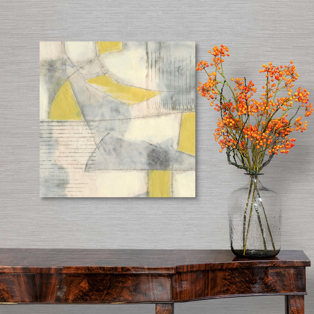 A traditional room featuring Contemporary abstract painting using pale yellows and gray in geometric shapes.