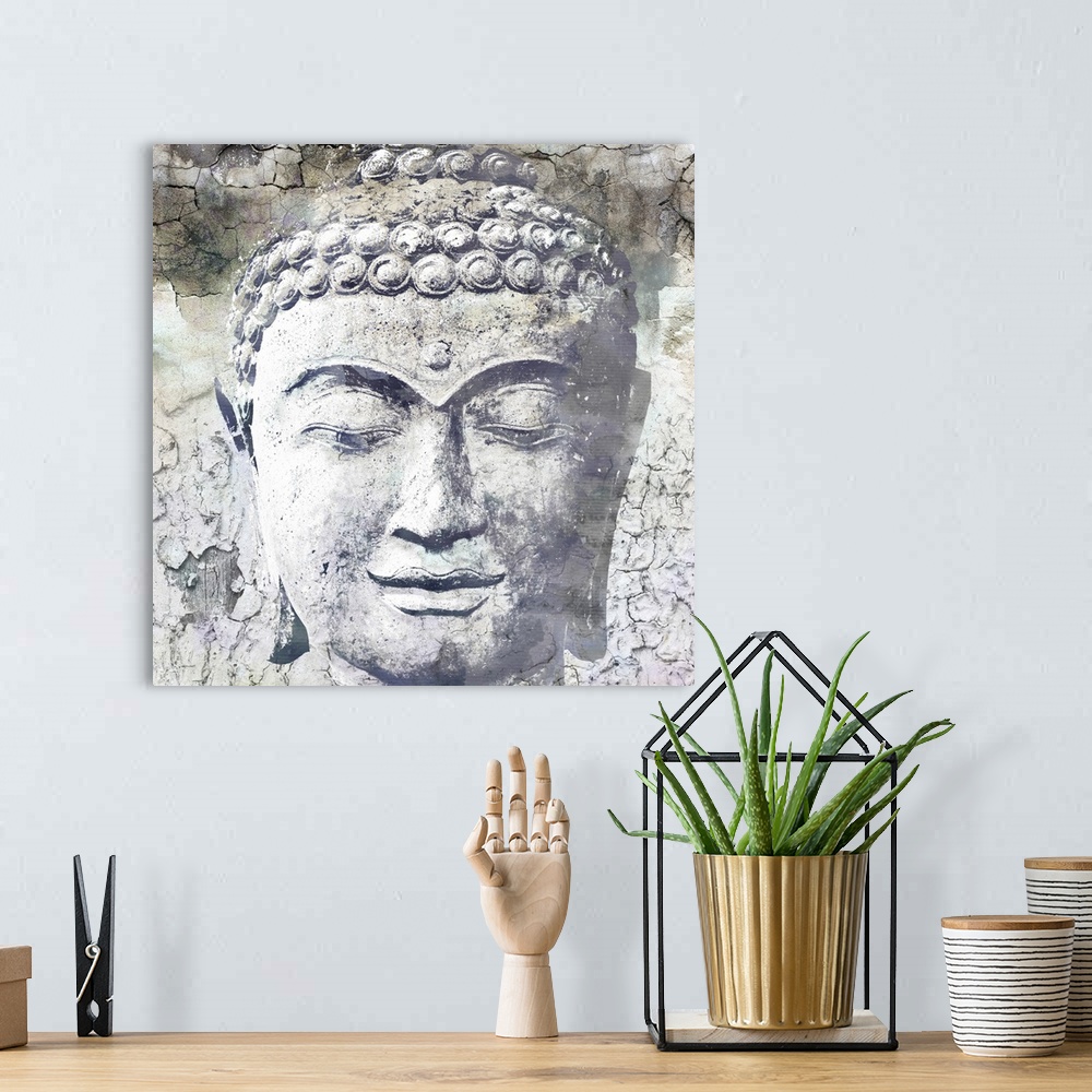 A bohemian room featuring Close up photo of the face of a sculpture of Buddha, showing his downcast eyes and tight curls in...