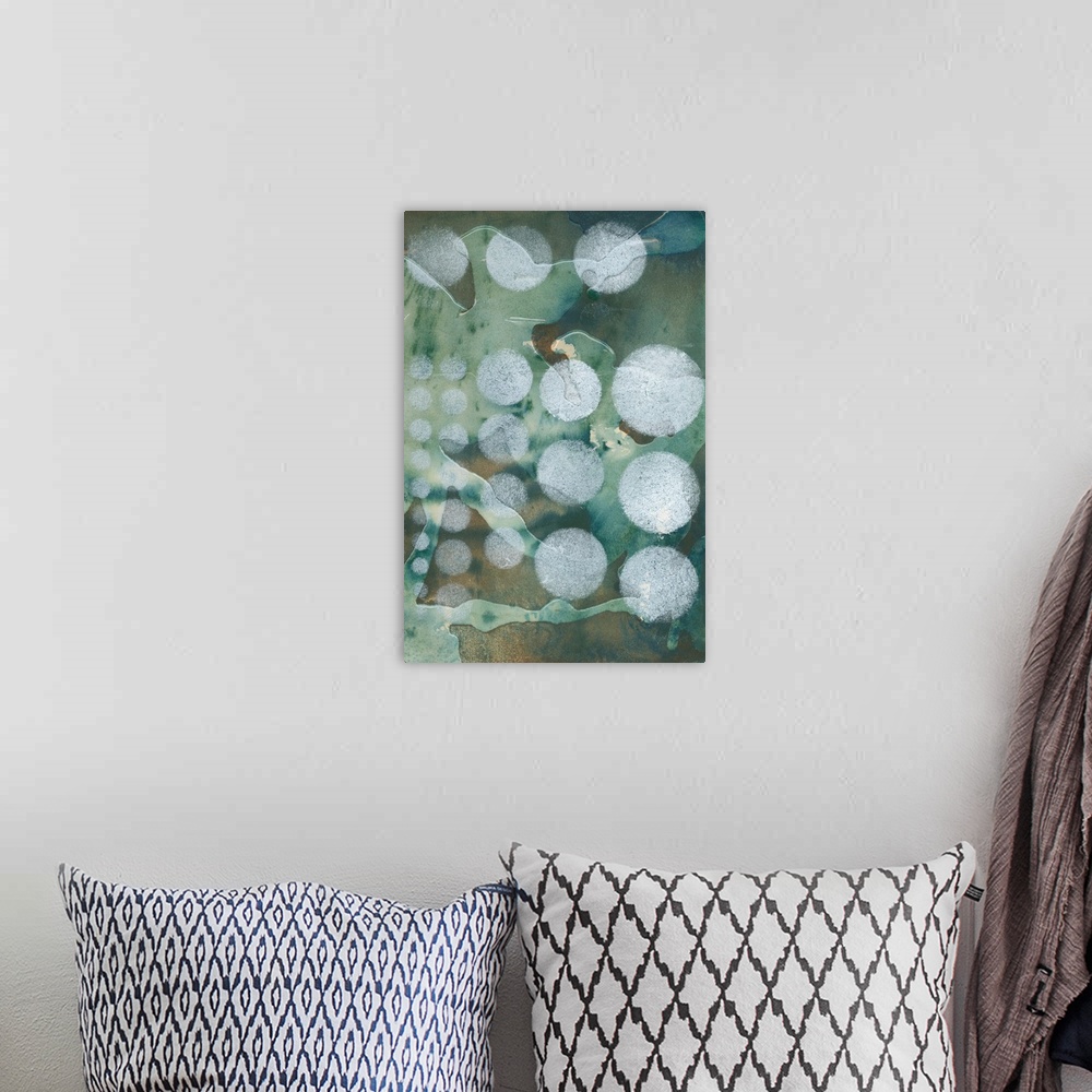A bohemian room featuring Contemporary abstract painting using pale blue circles against an abstract muted green background.