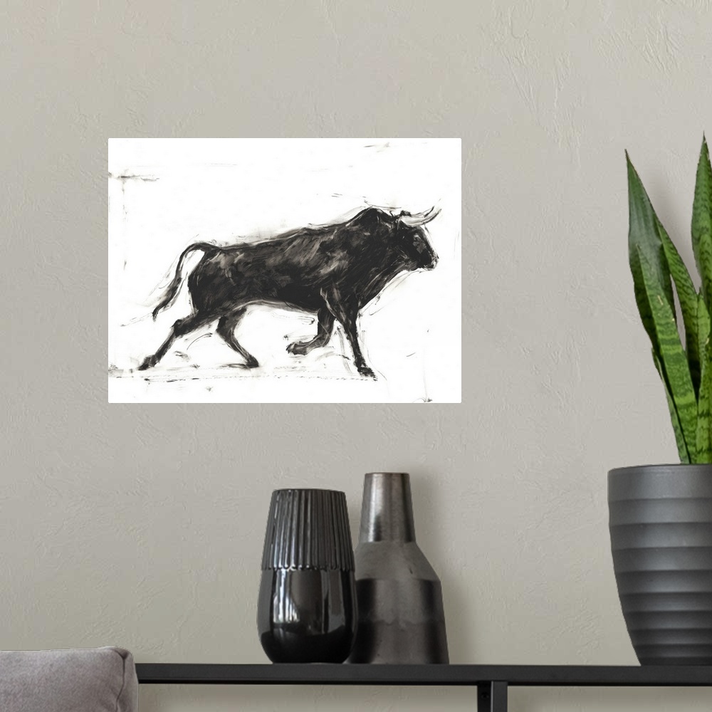 A modern room featuring Black and white painting of a Spanish bull in action.