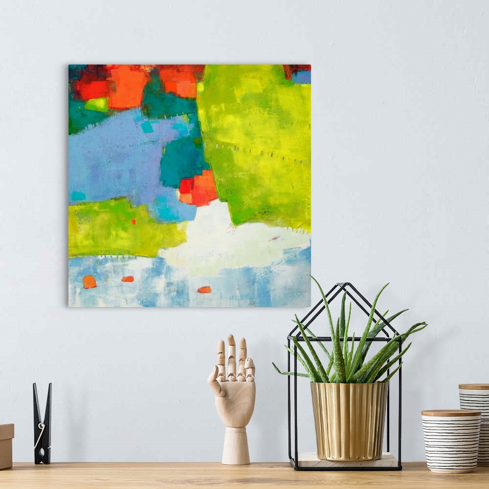 A bohemian room featuring Abstract contemporary art in tropical lime green, blue, and bright orange.