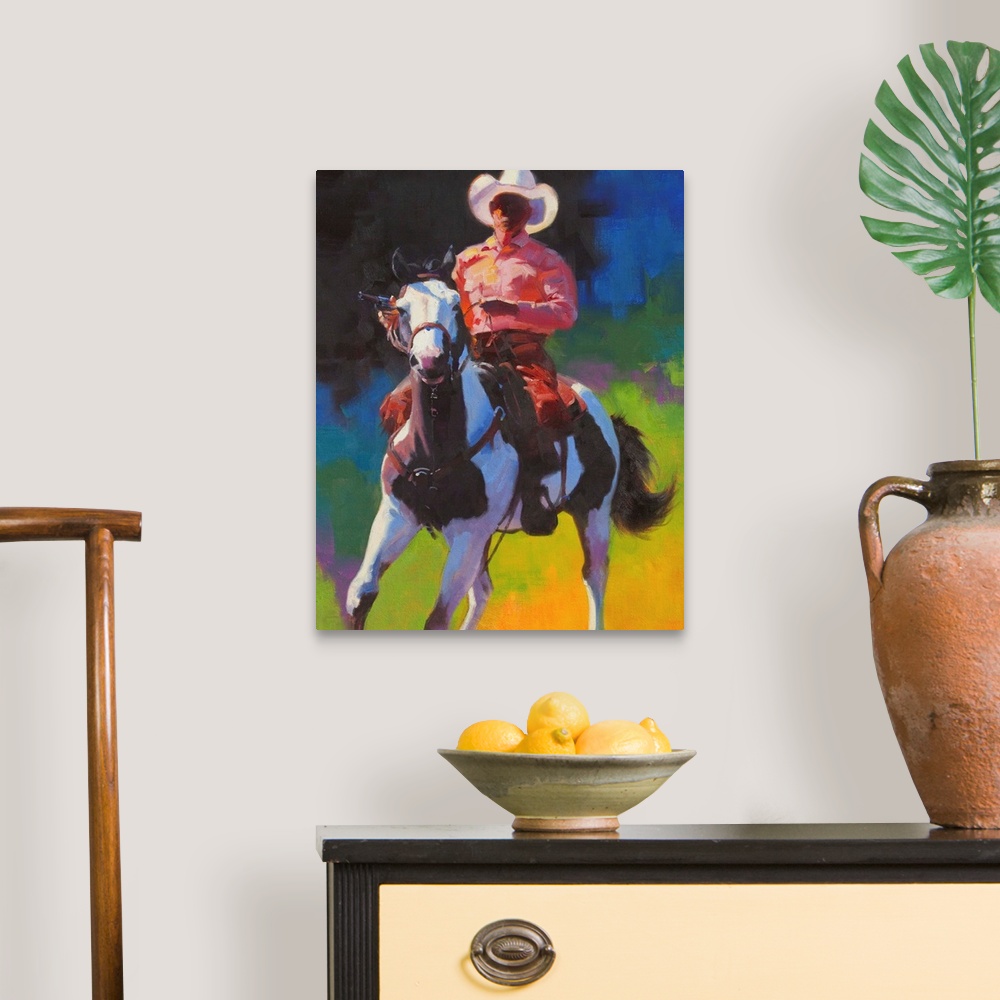 A traditional room featuring Contemporary painting of a cowboy atop of a brown and white paint horse.