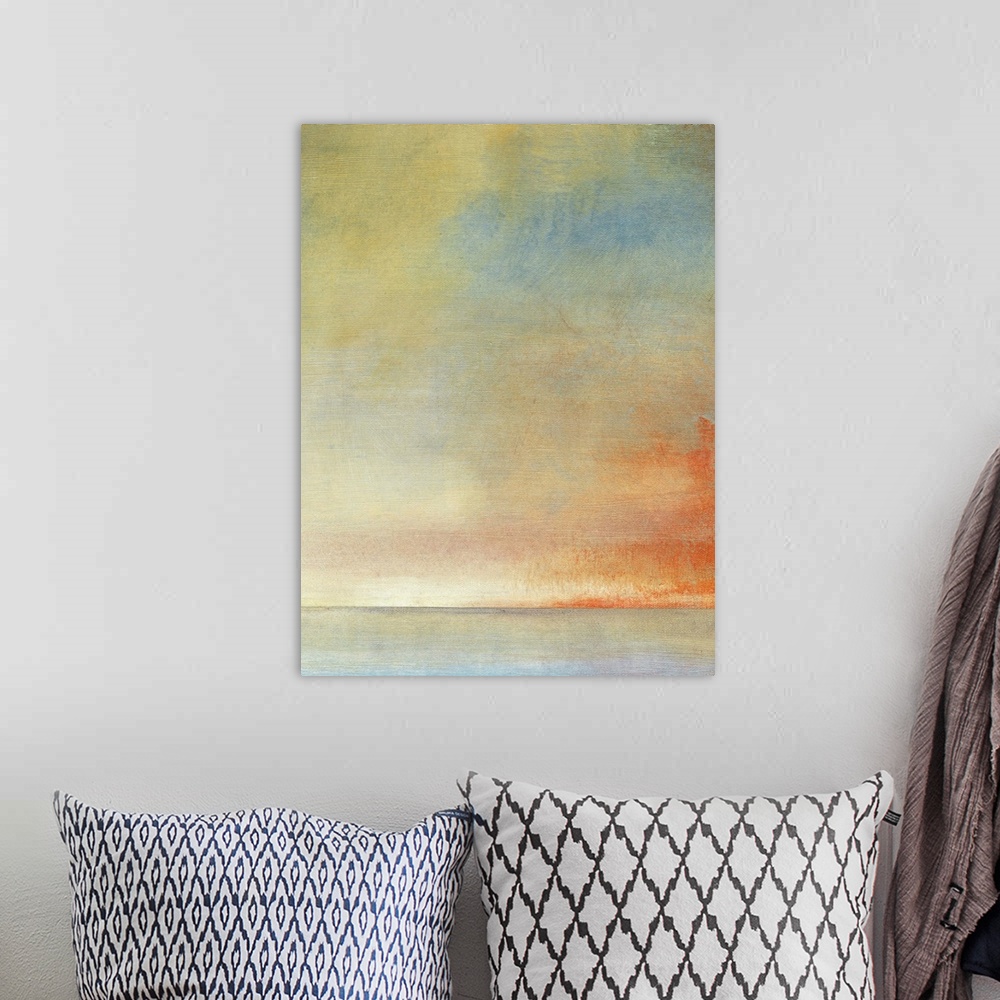 A bohemian room featuring Abstract artwork with warmer colors and blue thrown in to contrast.