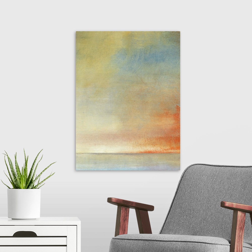 A modern room featuring Abstract artwork with warmer colors and blue thrown in to contrast.