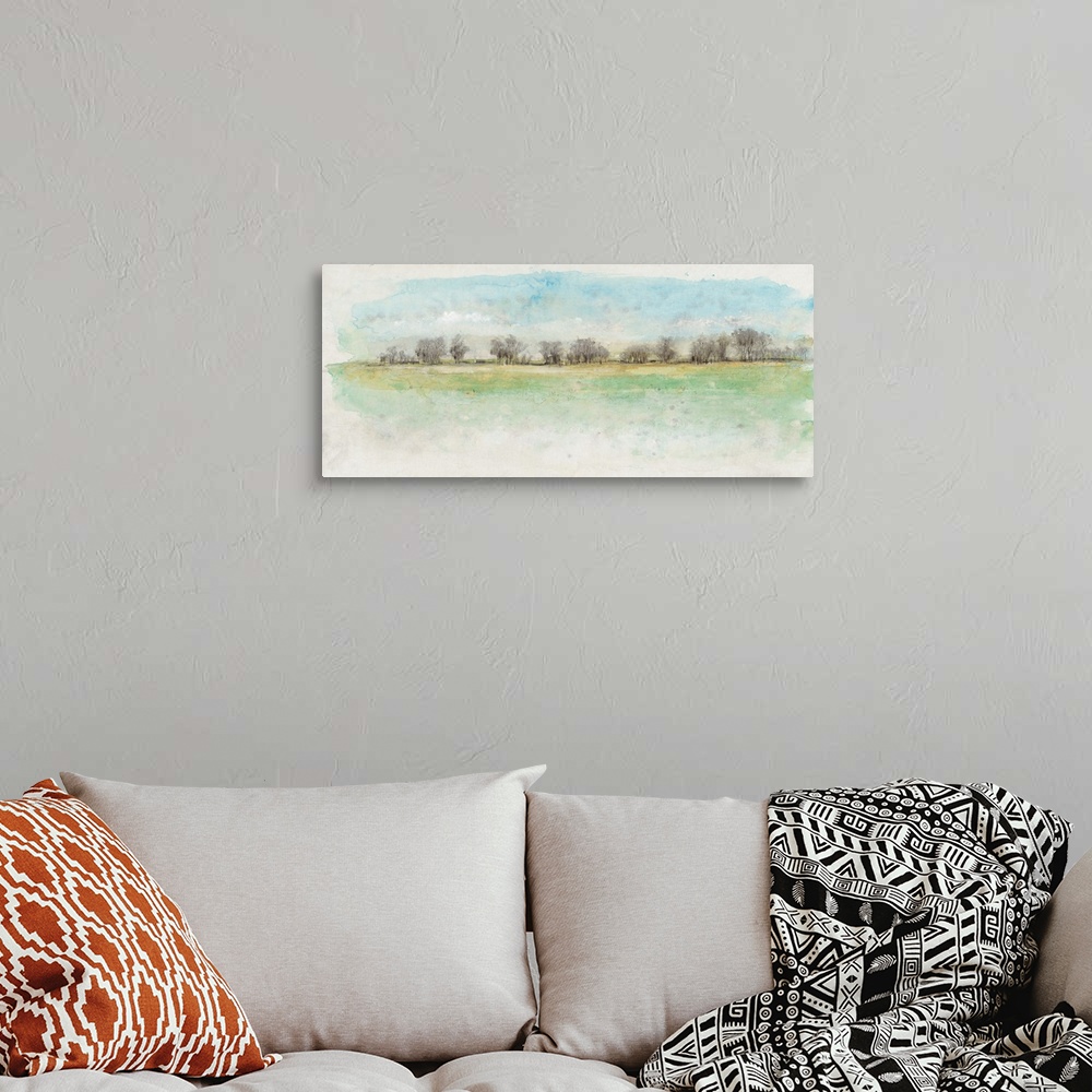 A bohemian room featuring Watercolor painting of a row of trees at the edge of a meadow.
