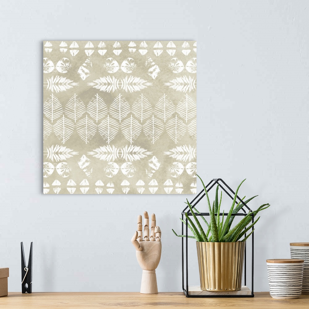 A bohemian room featuring White coastal illustrations resembling tribal patterns on a taupe background.