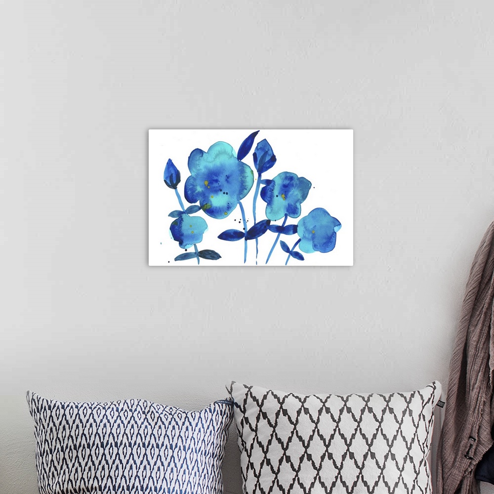 A bohemian room featuring Watercolor silhouettes of flowers in bright blue.