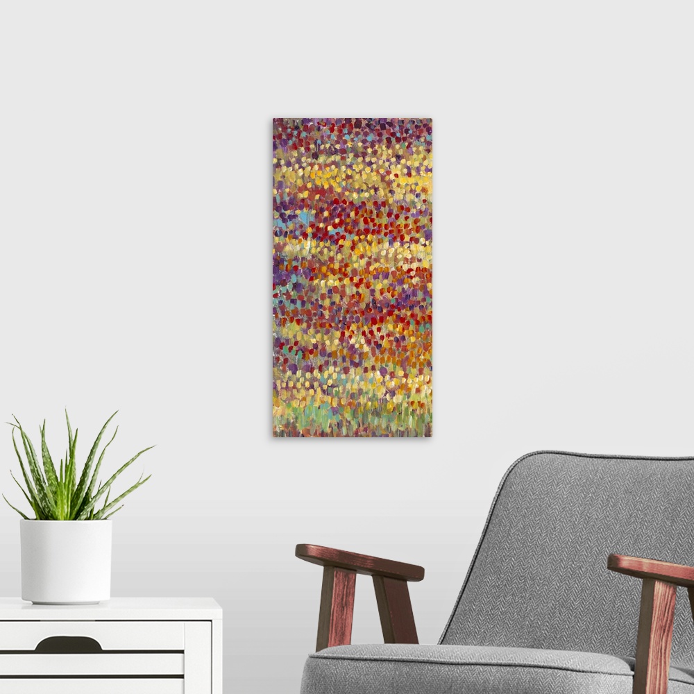 A modern room featuring Vertical contemporary painting of a field of tulips in bright, colorful dots of colors in an impr...