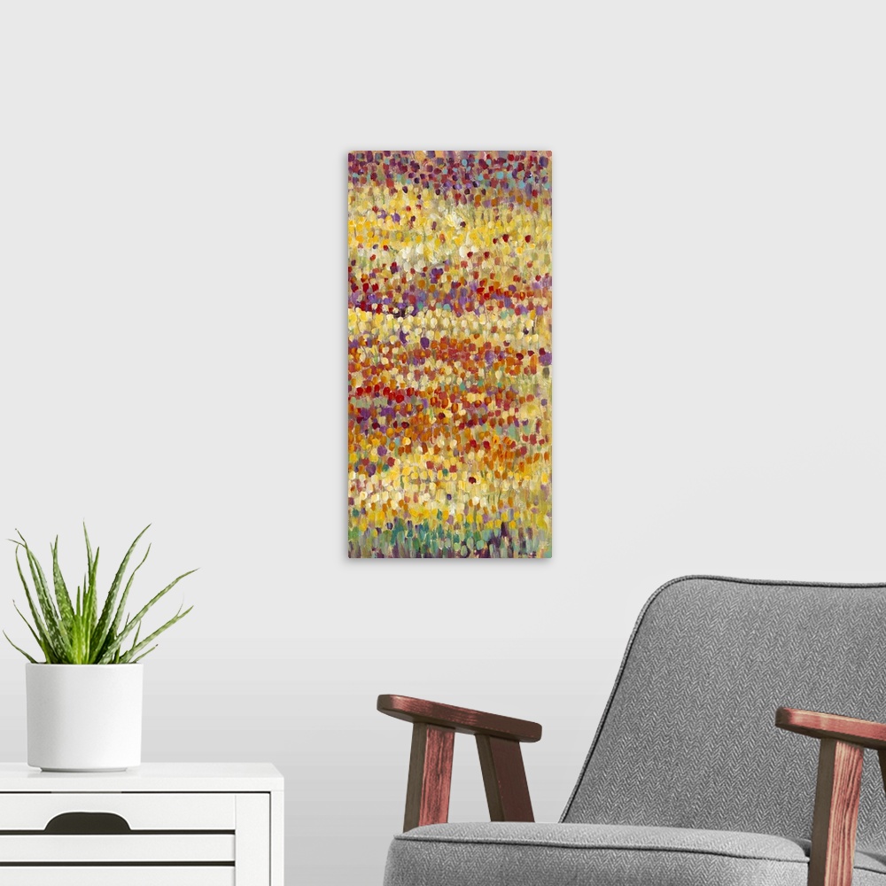 A modern room featuring Vertical contemporary painting of a field of tulips in bright, colorful dots of colors in an impr...