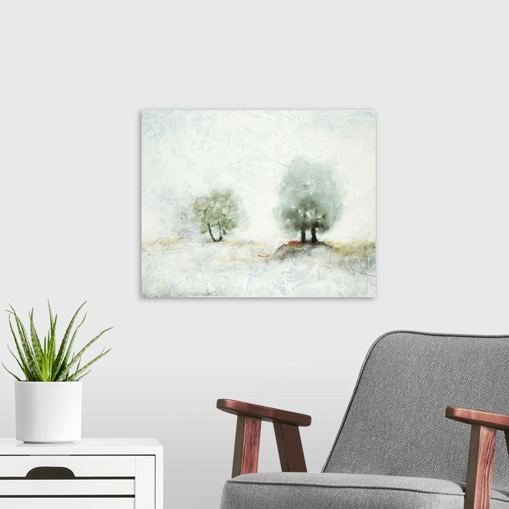 A modern room featuring Pastel landscape painting of two trees in the misty countryside.