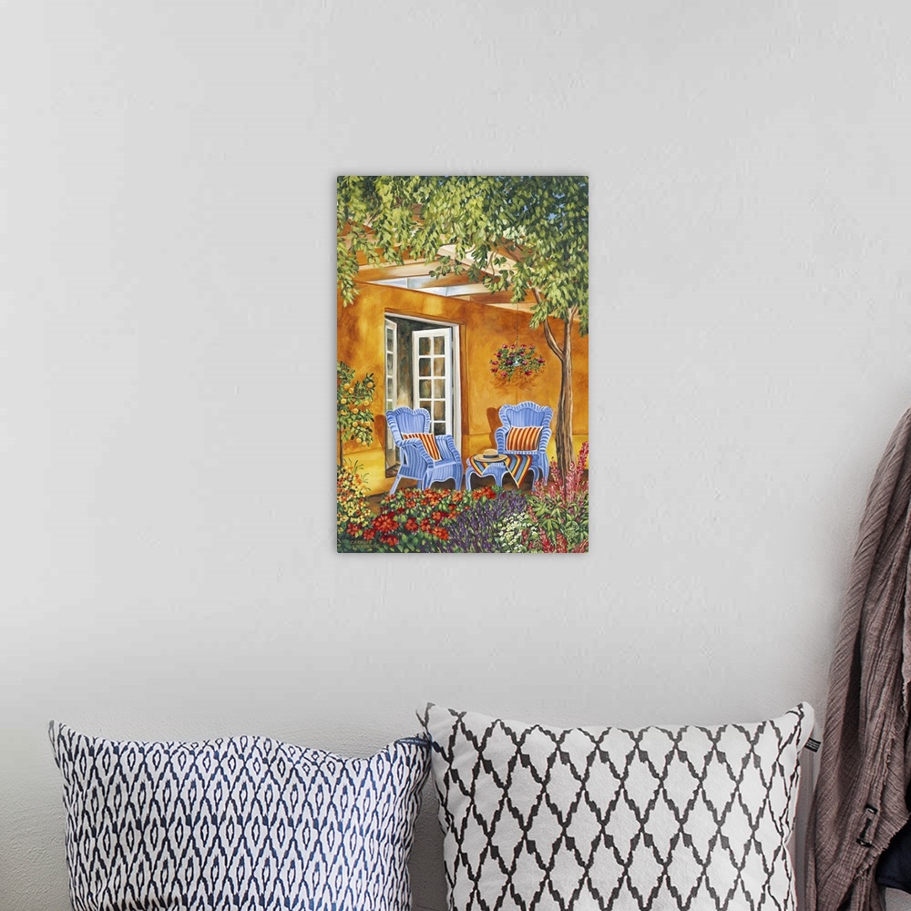 A bohemian room featuring Contemporary painting of a Mediterranean patio with two comfortable chairs and a shady tree.