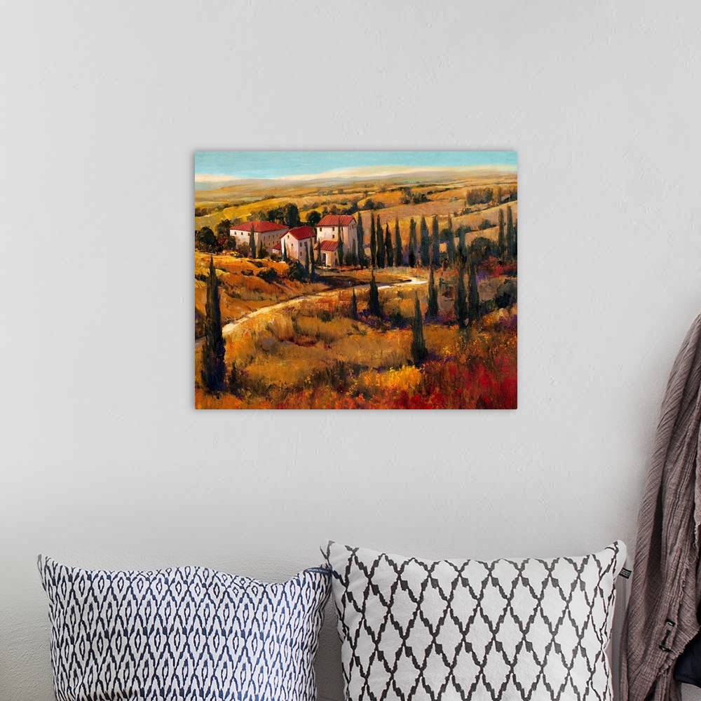 A bohemian room featuring Painting of the land surrounding a villa in Tuscany.