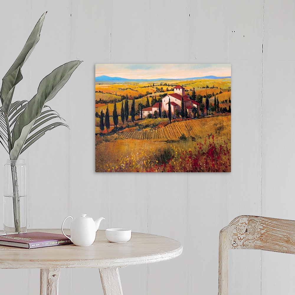 A farmhouse room featuring This decorative accent for the living room or kitchen is a landscape painting of a church in the ...