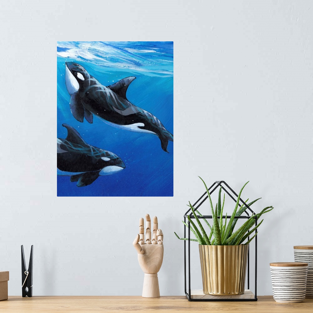 A bohemian room featuring Contemporary painting of two orca whales swimming close to the surface of the ocean.