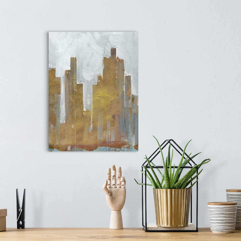 A bohemian room featuring Contemporary abstract artwork using muted colors and geometric shapes resembling a city skyline.