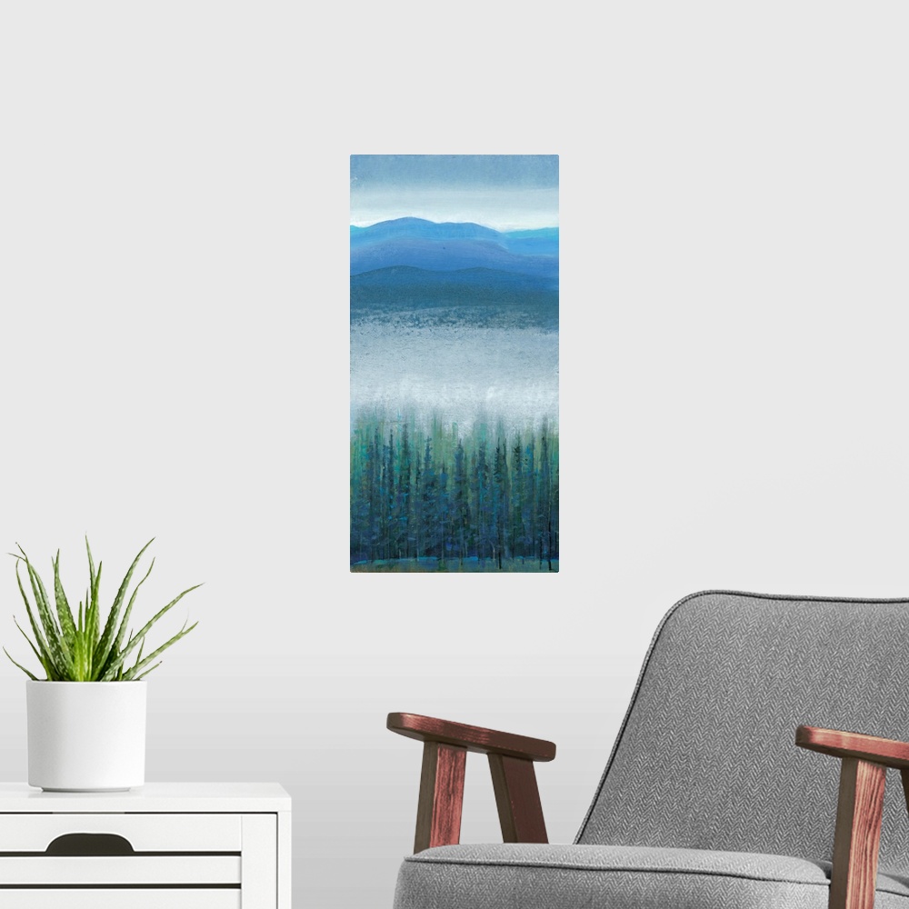A modern room featuring Vertical painting of a mountain valley with dense fog over pine trees.