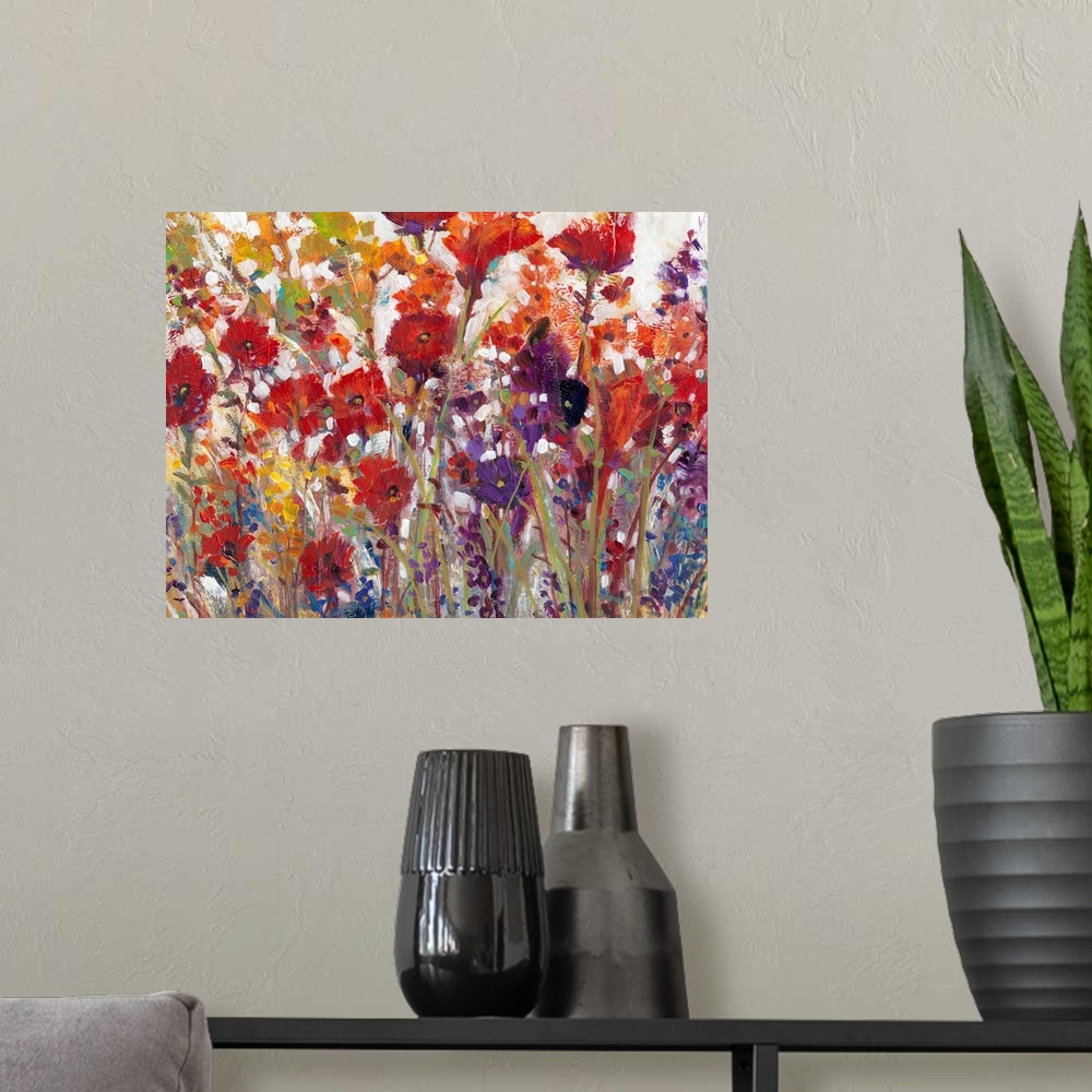 A modern room featuring This decorative artwork features sprouting bright wildflowers made from whimsical brush strokes w...