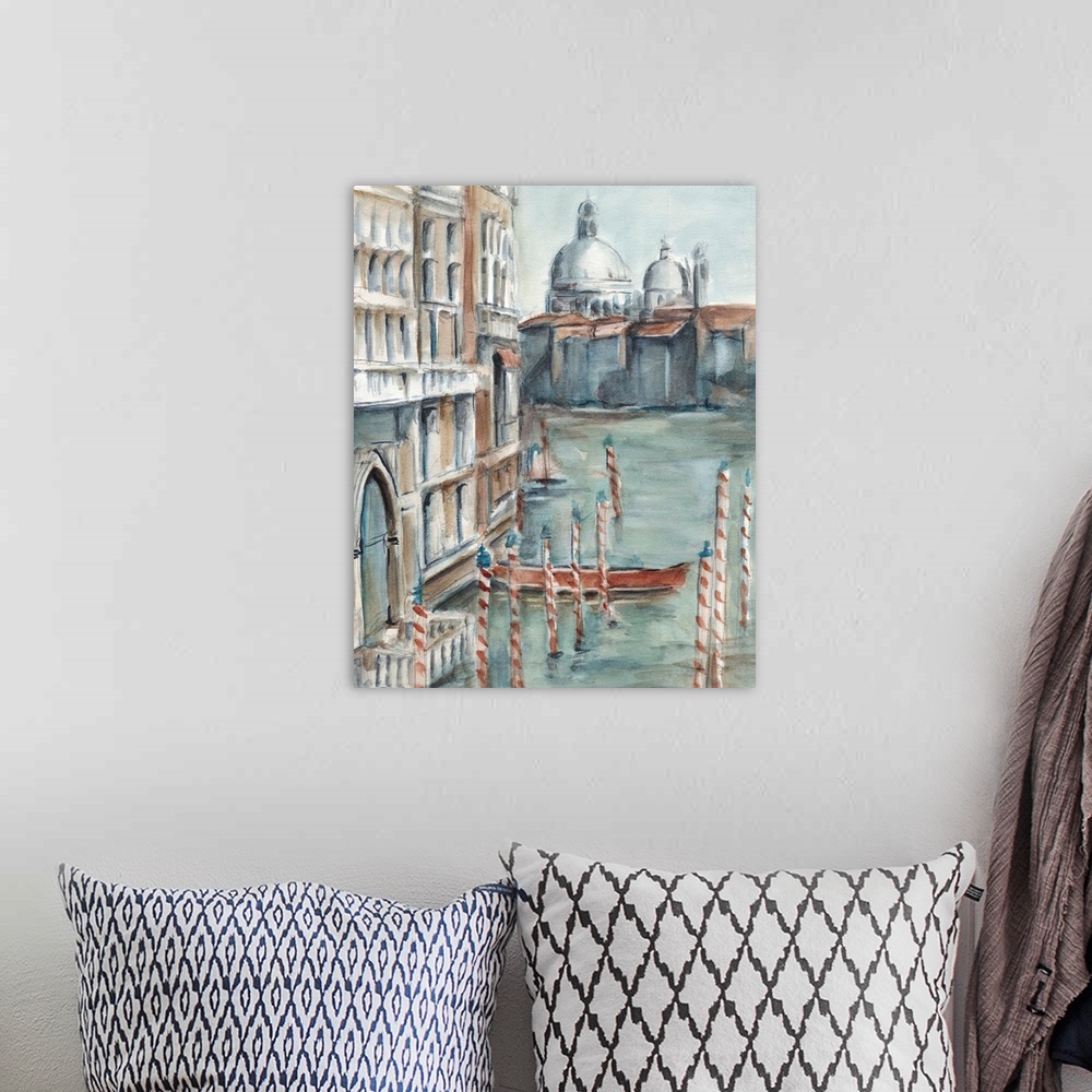 A bohemian room featuring Watercolor painting of Venice, Italy, with a gondola docked in the canal.