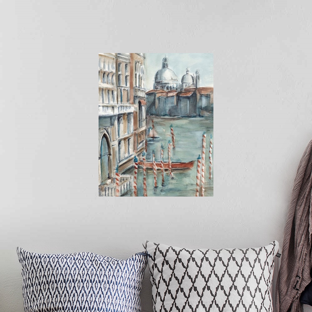 A bohemian room featuring Watercolor painting of Venice, Italy, with a gondola docked in the canal.