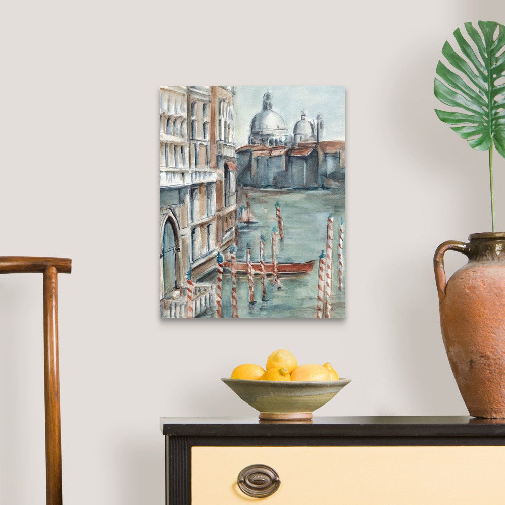 A traditional room featuring Watercolor painting of Venice, Italy, with a gondola docked in the canal.