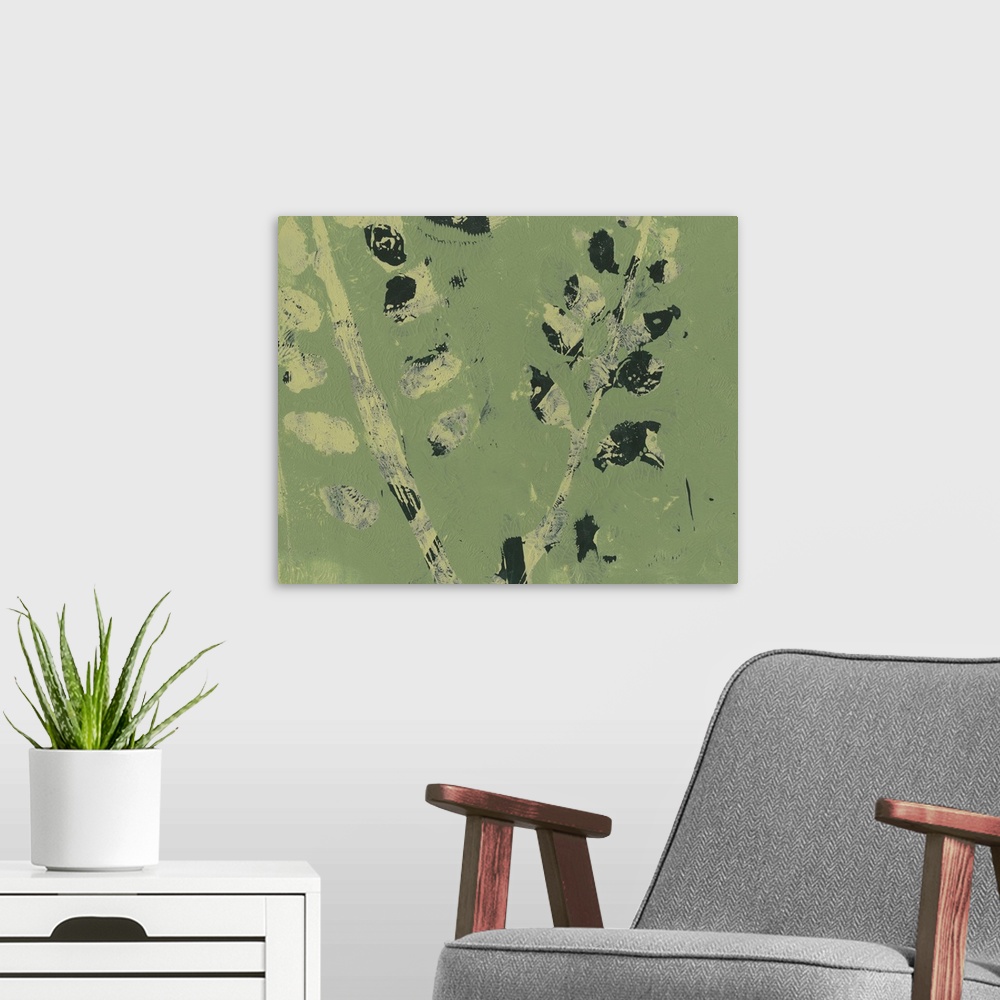 A modern room featuring Abstract image of shapes similar to leaves on a branch in merging colors of green and black.