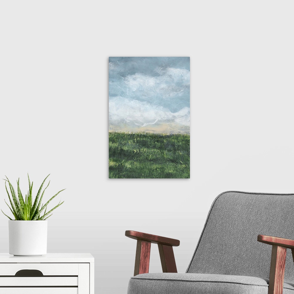 A modern room featuring Vertical painting of a green field and cloud filled blue sky.