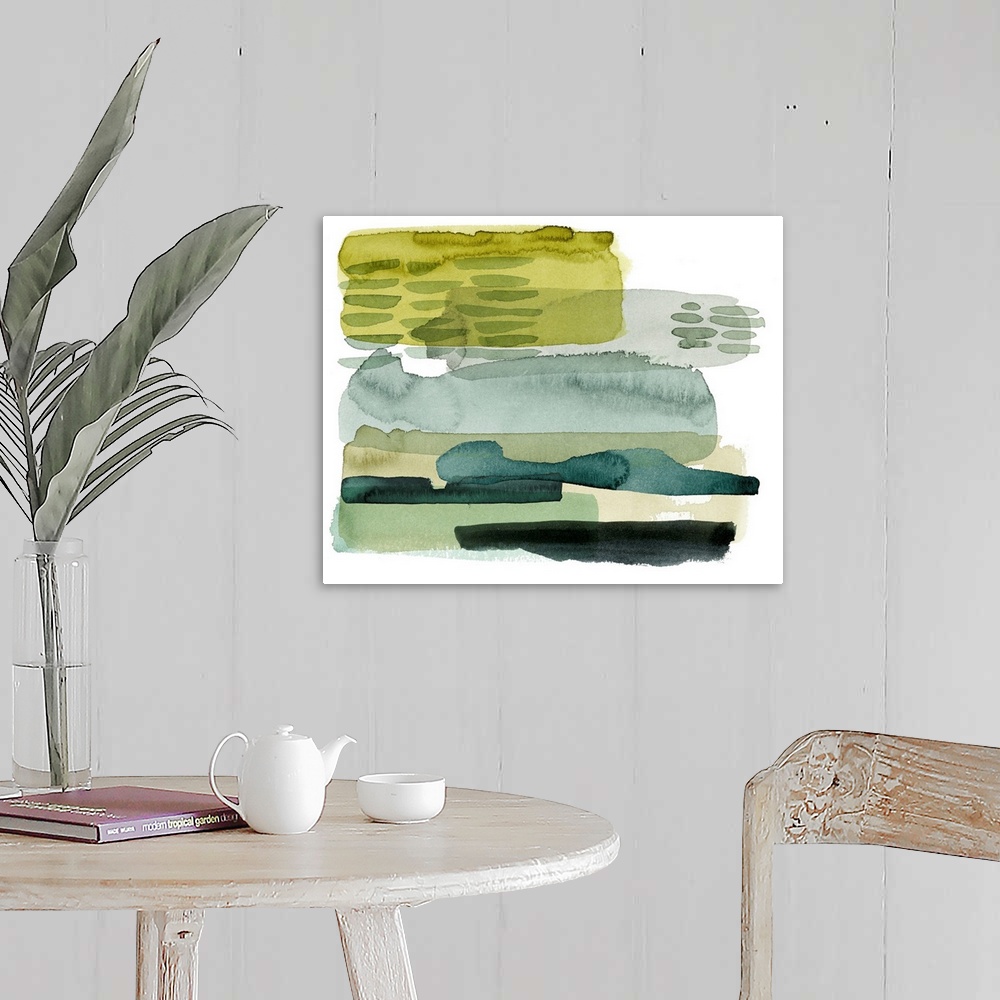A farmhouse room featuring Watercolor artwork in overlapping shades of green and yellow on white.