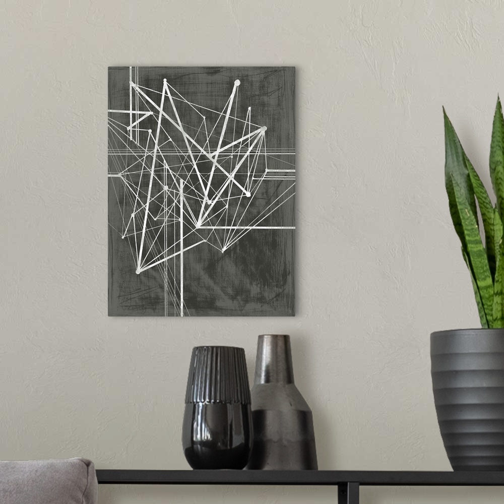A modern room featuring Abstract painting made of several jagged lines on a dark background.