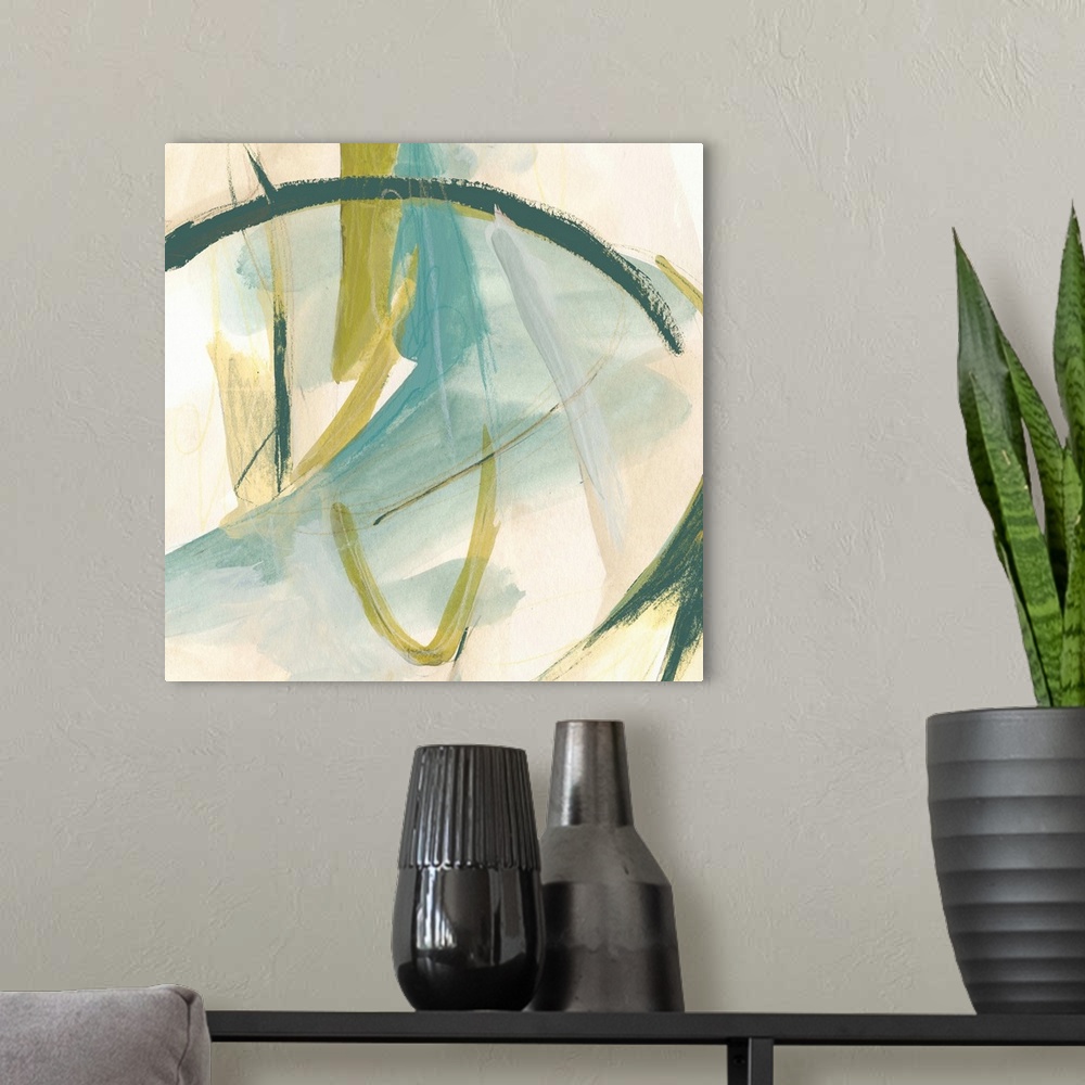 A modern room featuring Modern abstract painting in yellow, teal, and beige.