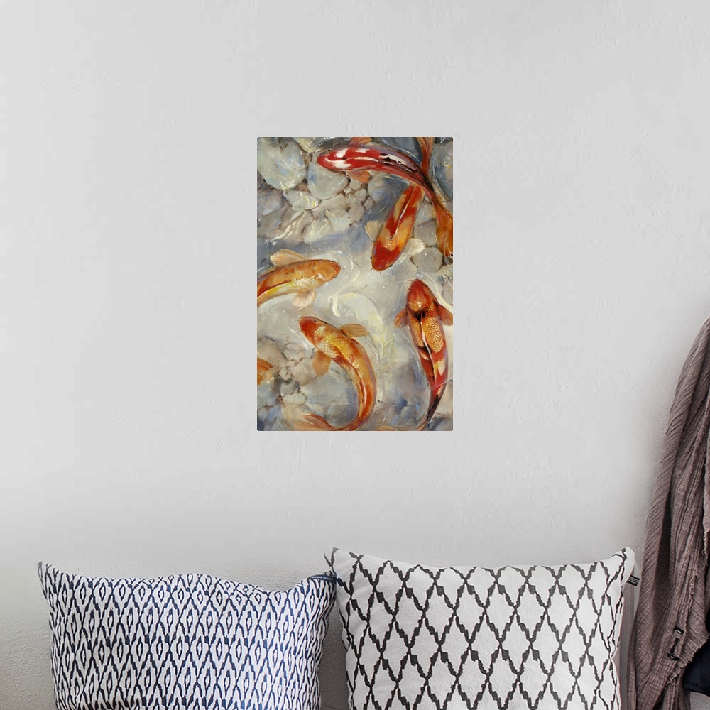 A bohemian room featuring A group of bright red and orange fish swimming in a pond with a rocky floor.