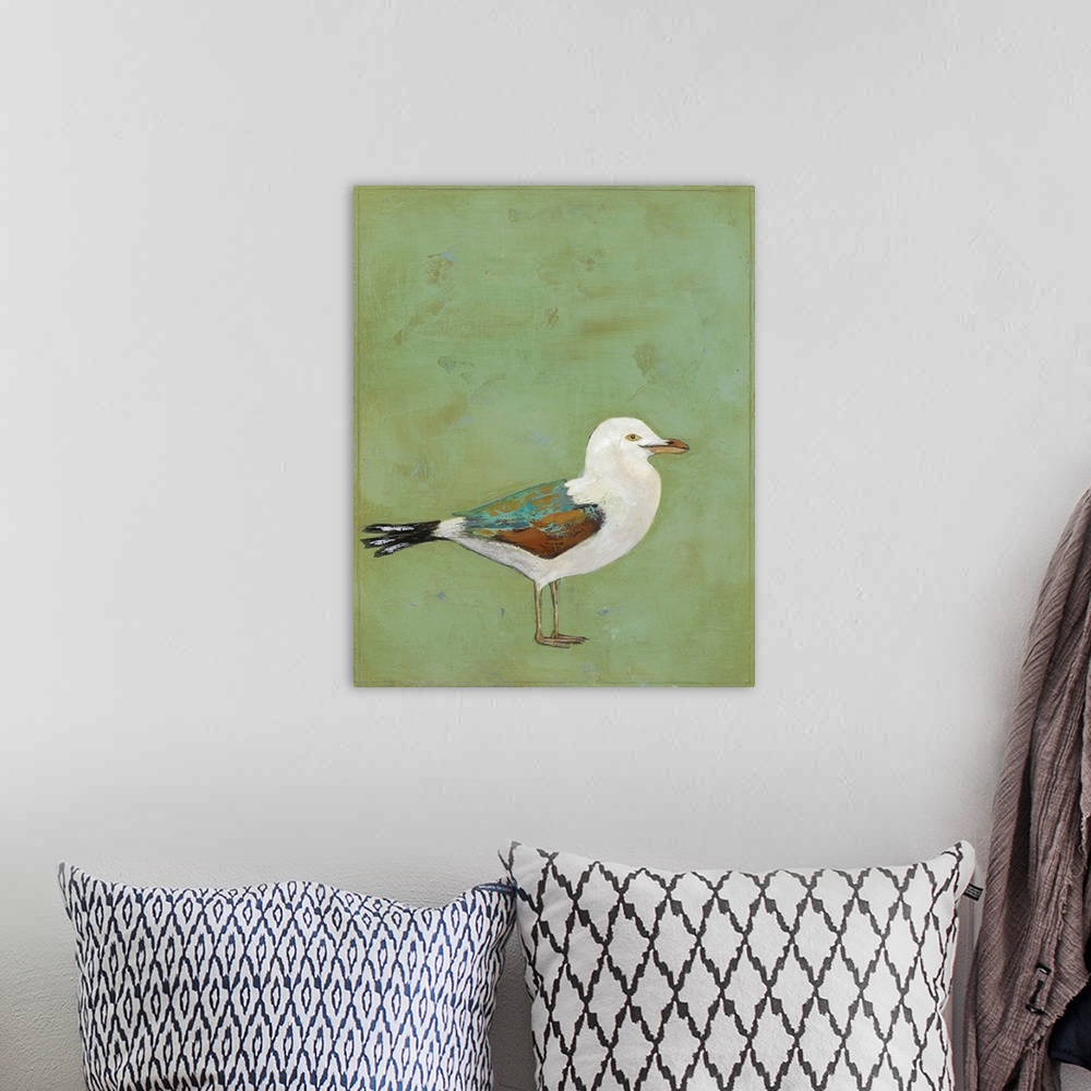 A bohemian room featuring Contemporary painting of a seagull against a green background.