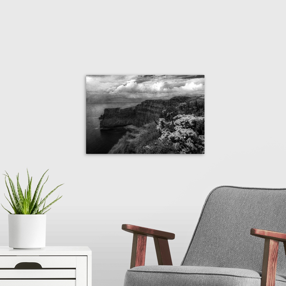 A modern room featuring Fine art photo of cliffs on the Irish coast under a stormy sky.
