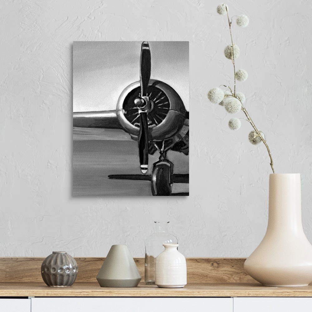 A farmhouse room featuring Vertical, oversized artwork of a wing, propeller and wheel on a vintage airplane, casting a shado...
