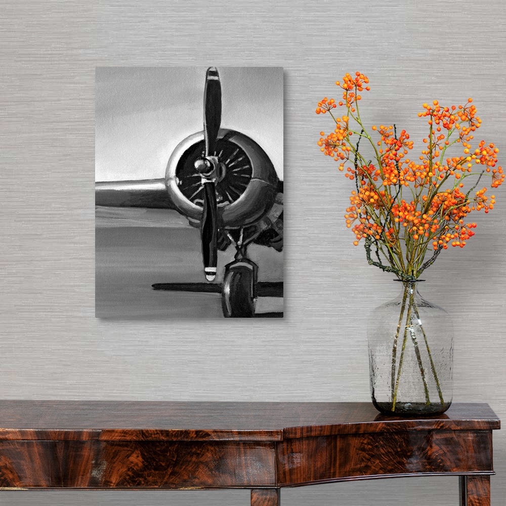 A traditional room featuring Vertical, oversized artwork of a wing, propeller and wheel on a vintage airplane, casting a shado...