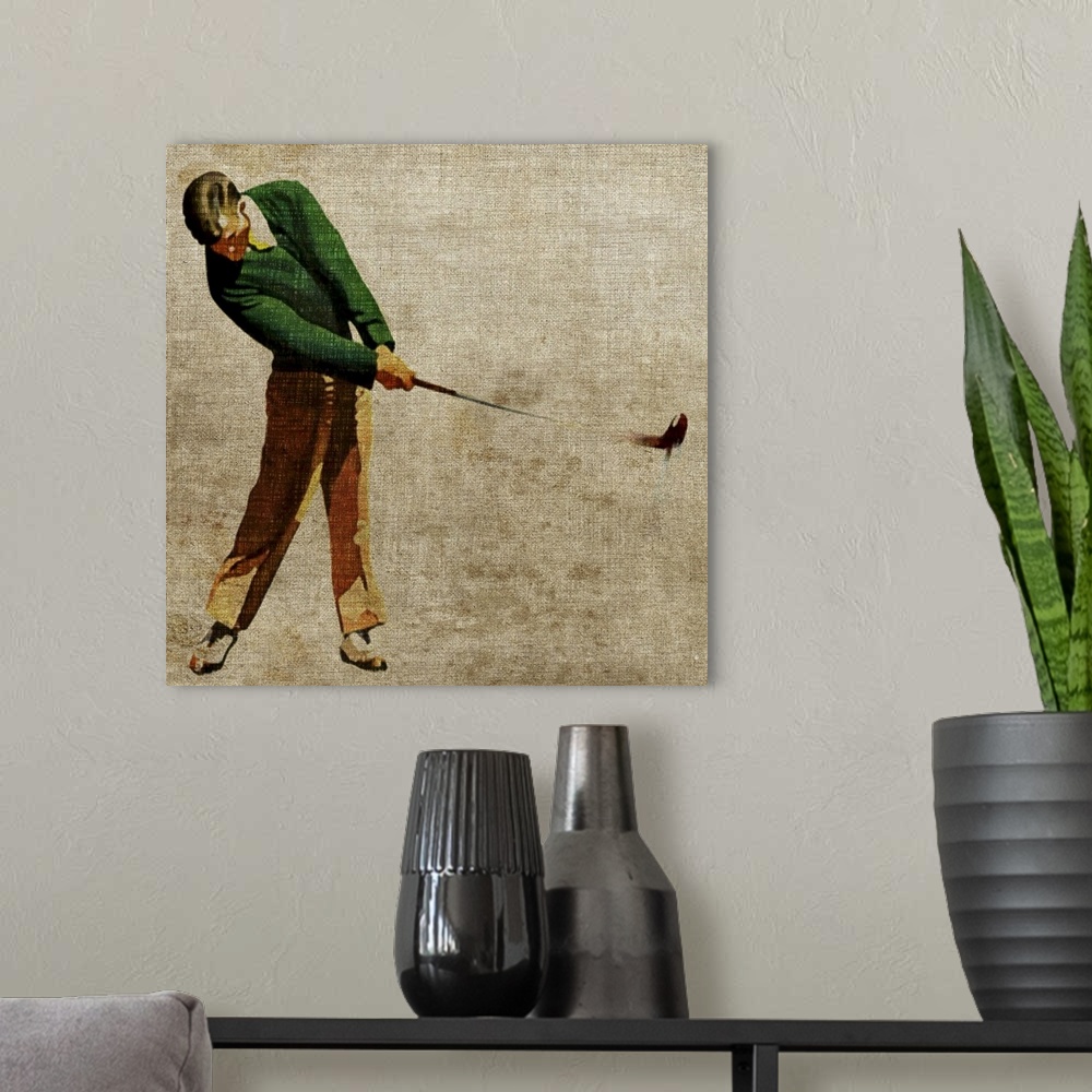A modern room featuring Square, large, vintage wall picture of a man in slacks and a cardigan swinging a golf club, on a ...