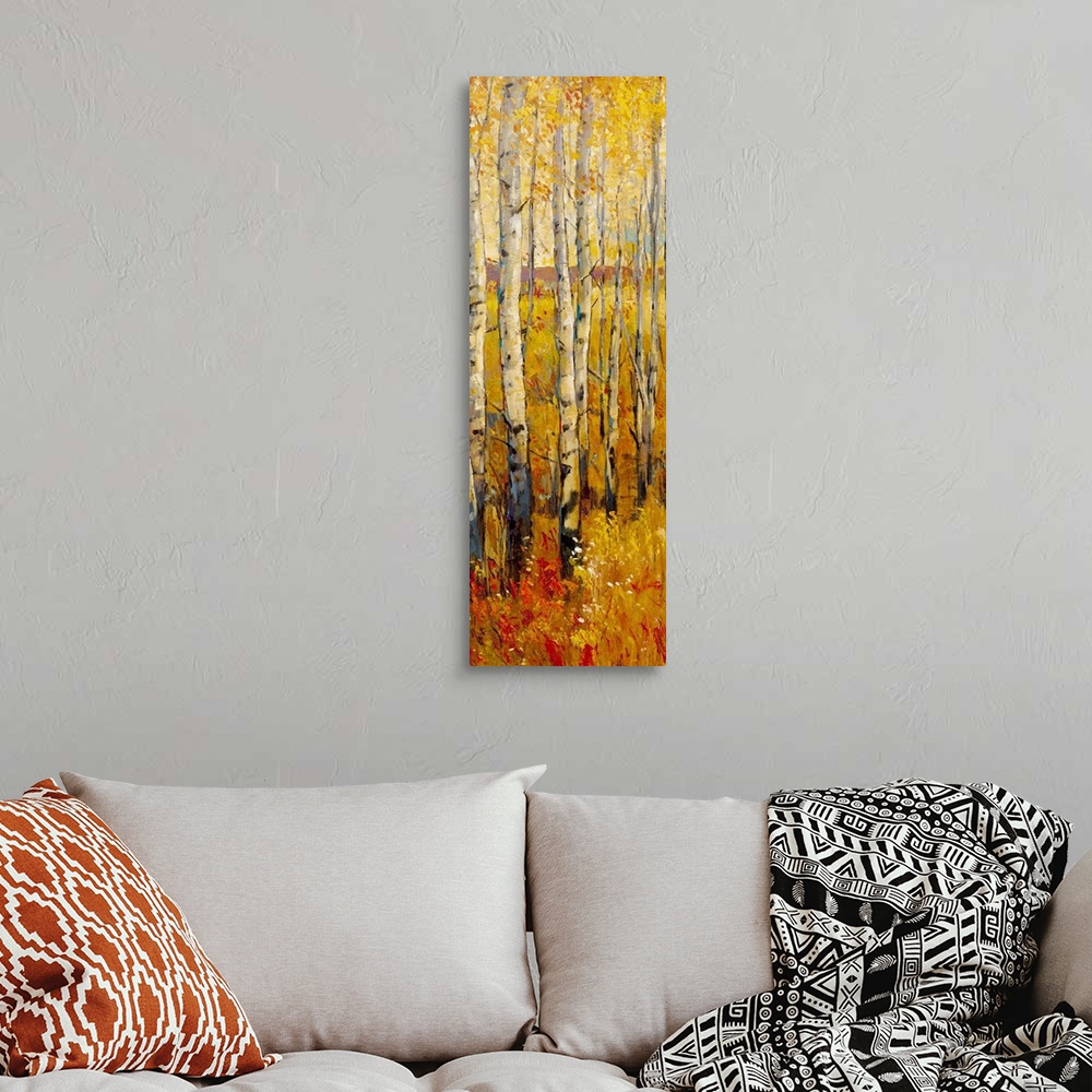 A bohemian room featuring Oversized, vertical contemporary painting of a dense forest of birch trees in the fall, with gold...