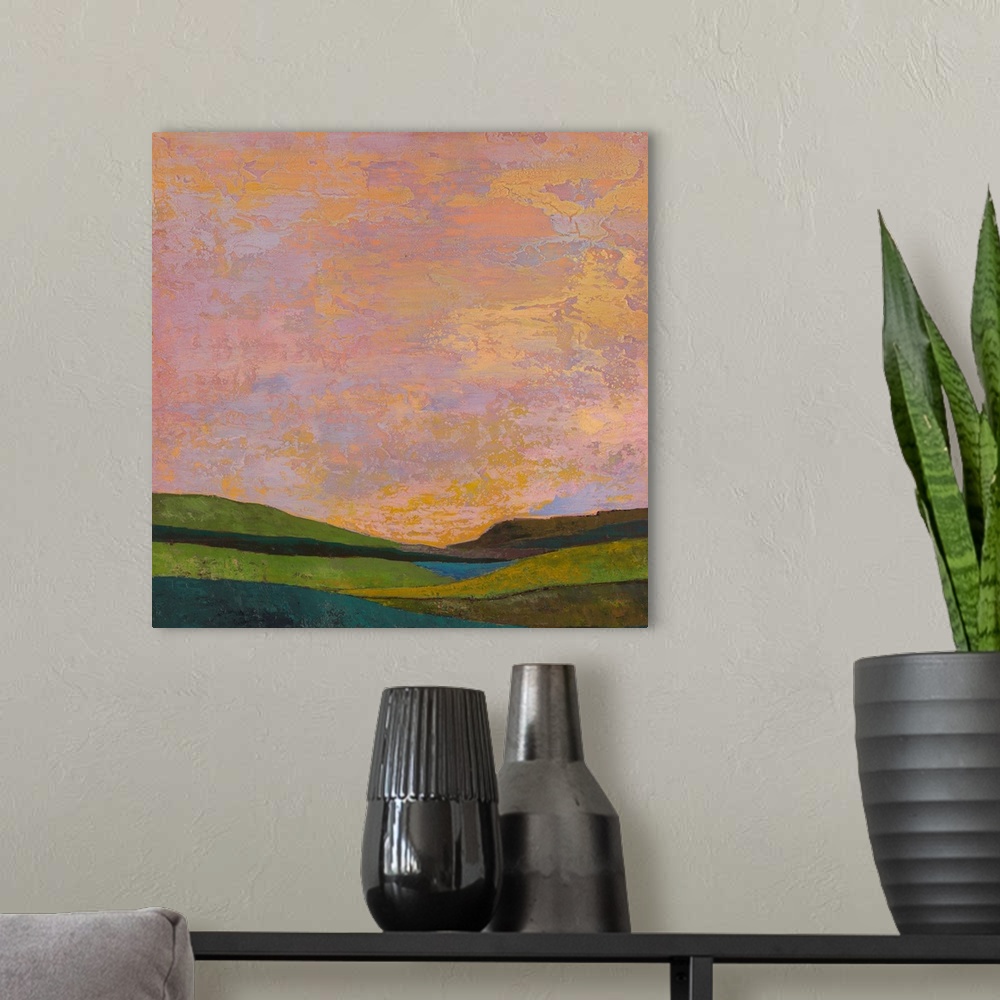 A modern room featuring Contemporary abstract painting using color to and shape to suggest a landscape.